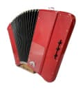 Accordéon en position de jeu, dos (image catalogue)